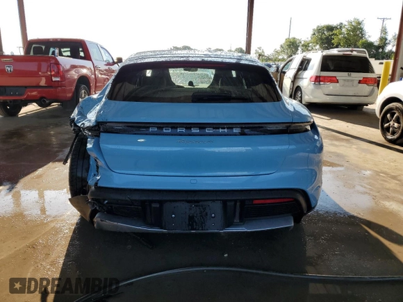 2022 Porsche Taycan 4 with VIN WP0BA2Y13NSA67673, listed as a Copart auction lot 52858563 with 10,690 mi miles and . Bid and sale history available at DreamBid. Image 6.