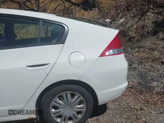 2011 Honda Insight with VIN JHMZE2H30BS012285, listed as a IAAI auction lot 42145139 with 161,672 mi miles and . Bid and sale history available at DreamBid. Image 17.