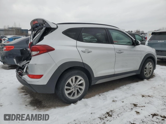 2018 Hyundai Tucson SEL with VIN KM8J3CA41JU803954, listed as a Copart auction lot 88039715 with 49,759 mi miles and Salvage Title. Bid and sale history available at carsss.com. Image 3.