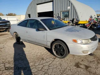 2000 Toyota Solara SE with VIN 2T1CG22P3YC379964, listed as a Copart auction lot 77624434 with 161,899 mi miles and Salvage Title. Bid and sale history available at carsss.com. Image 4.