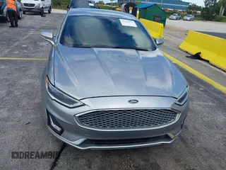 2020 Ford Fusion Titanium with VIN 3FA6P0D95LR199443, listed as a IAAI auction lot 42721371 with 77,592 mi miles and . Bid and sale history available at DreamBid. Image 12.