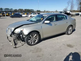 2011 Lincoln MKS EcoBoost with VIN 1LNHL9FTXBG604676, listed as a Copart auction lot 87628565 with 214,373 mi miles and Salvage Title. Bid and sale history available at DreamBid. Image 1.