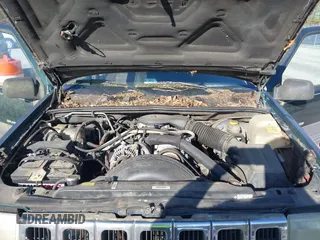1996 Jeep Grand Cherokee with VIN 1J4EZ58Y7TC128428, listed as a IAAI auction lot 42050443 with 241,591 mi miles and . Bid and sale history available at DreamBid. Image 10.