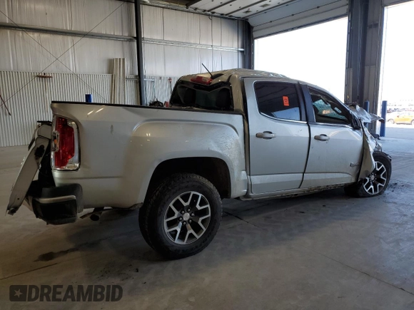 2015 GMC Canyon 4WD SLE with VIN 1GTG6BE36F1263317, listed as a Copart auction lot 53967805 with 129,590 mi miles and Salvage title. Bid and sale history available at DreamBid. Image 3.