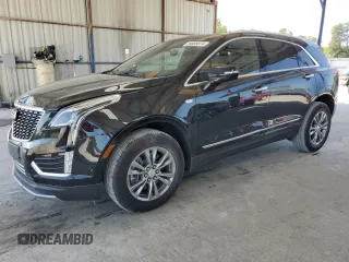 2021 Cadillac XT5 FWD Premium Luxury z VIN 1GYKNCRSXMZ155473, wystawiony jako Copart lot #59883874 z przebiegiem 2 038 mil mil oraz Szkoda całkowita • Salvage title. Historia ofert i sprzedaży dostępna na DreamBid. Obrazek 1.