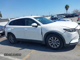 2019 Mazda CX-9 Touring with VIN JM3TCACY5K0306424, listed as a IAAI auction lot 42150466 with 95,166 mi miles and . Bid and sale history available at DreamBid. Image 13.
