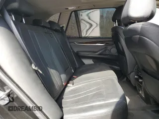2016 BMW X5 xDrive40e z VIN 5UXKT0C59G0S77407, wystawiony jako Copart lot #50094255 z przebiegiem 93 264 mil mil oraz Szkoda całkowita • Salvage title. Historia ofert i sprzedaży dostępna na DreamBid. Obrazek 11.