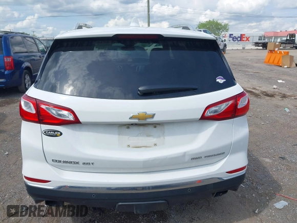 2019 Chevrolet Equinox Premier with VIN 3GNAXYEX7KS502799, listed as a IAAI auction lot 42102610 with 73,575 mi miles and . Bid and sale history available at DreamBid. Image 17.