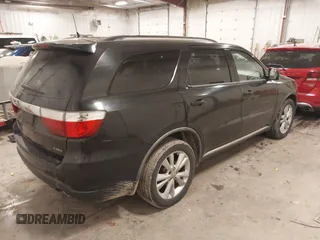 2012 Dodge Durango Crew with VIN 1C4SDJDT6CC205946, listed as a IAAI auction lot 41531175 with 211,372 mi miles and . Bid and sale history available at carsss.com. Image 4.
