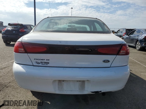 2002 Ford Escort Fleet Standard z VIN 3FAFP13P62R137425, wystawiony jako Copart lot #72697334 z przebiegiem 137 921 mil mil oraz Szkoda całkowita • Salvage title. Historia ofert i sprzedaży dostępna na DreamBid. Obrazek 6.
