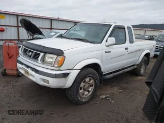 1999 Nissan Frontier XE with VIN 1N6ED26Y1XC302972, listed as a IAAI auction lot 41506144 with 173,340 mi miles and . Bid and sale history available at DreamBid. Image 2.