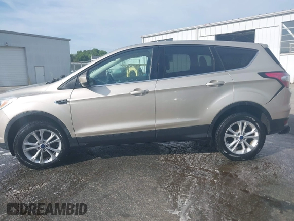 2017 Ford Escape SE with VIN 1FMCU9GD1HUC70823, listed as a IAAI auction lot 41898457 with 86,042 mi miles and . Bid and sale history available at DreamBid. Image 14.