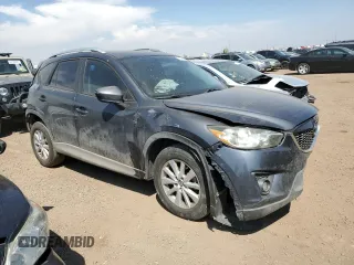 2014 Mazda CX-5 Sport z VIN JM3KE4BE1E0359446, wystawiony jako Copart lot #54562545 z przebiegiem 128 150 mil mil oraz Szkoda całkowita • Salvage title. Historia ofert i sprzedaży dostępna na DreamBid. Obrazek 4.