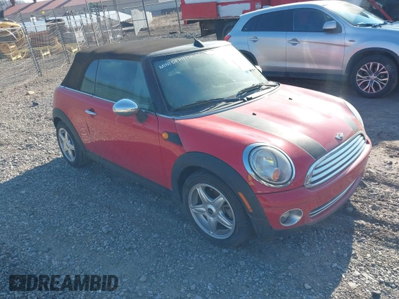 2010 MINI Convertible with VIN WMWMR3C59ATU97398, listed as a IAAI auction lot 41714054 with 12,663 mi miles and . Bid and sale history available at DreamBid. Image 1.