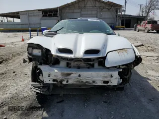 2002 Pontiac Firebird Formula z VIN 2G2FV22G222150957, wystawiony jako Copart lot #48037565 z przebiegiem 112 784 mil mil oraz Szkody całkowita. Historia ofert i sprzedaży dostępna na DreamBid. Obrazek 5.