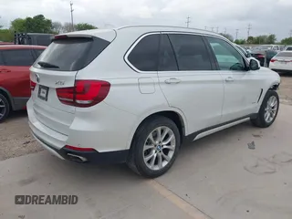 2018 BMW X5 xDrive35i with VIN 5UXKR0C51J0X91452, listed as a IAAI auction lot 41886539 with 39,521 mi miles. Bid and sale history available at carsss.com. Image 4.