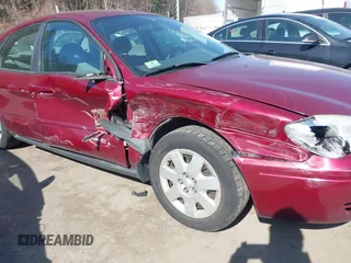 2004 Ford Taurus z VIN 1FAFP52244G193516, wystawiony jako IAAI lot #41780600 z przebiegiem 81 188 mil mil oraz . Historia ofert i sprzedaży dostępna na DreamBid. Obrazek 6.