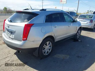 2011 Cadillac SRX Luxury Collection with VIN 3GYFNAEY8BS551380, listed as a IAAI auction lot 42090430 with 138,299 mi miles. Bid and sale history available at carsss.com. Image 4.