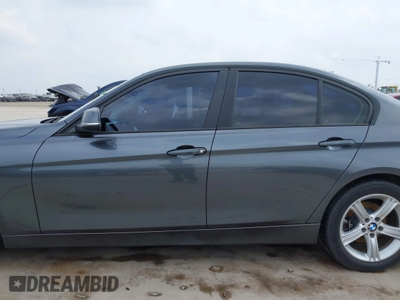 2013 BMW 3 Series 320i with VIN WBA3B1C53DK128602, listed as a IAAI auction lot 41952771 with 103,564 mi miles and . Bid and sale history available at carsss.com. Image 15.