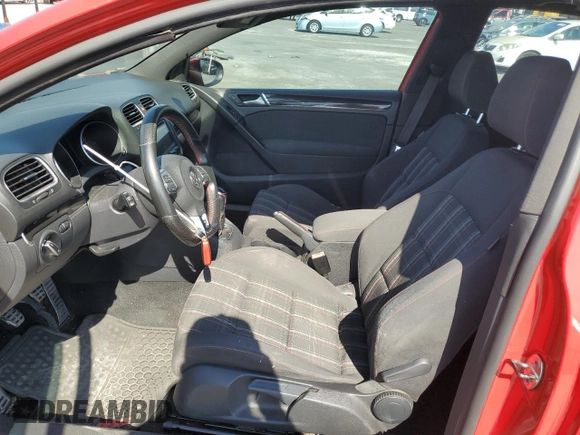 2012 Volkswagen GTI w/Conv & Sunroof z VIN WVWEV7AJ8CW148101, wystawiony jako Copart lot #74610214 z przebiegiem 154 813 mil mil oraz Szkoda całkowita • Salvage title. Historia ofert i sprzedaży dostępna na DreamBid. Obrazek 7.