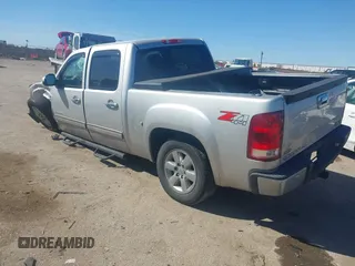 2010 GMC Sierra 1500 SLT z VIN 3GTRKWE30AG232120, wystawiony jako IAAI lot #41681642 z przebiegiem 156 058 mil mil oraz . Historia ofert i sprzedaży dostępna na DreamBid. Obrazek 3.