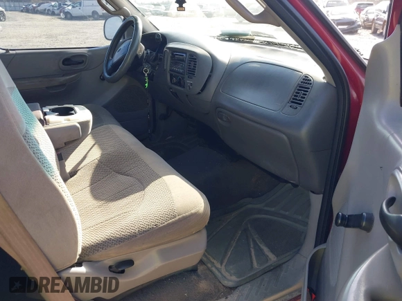2000 Ford F-150 XL with VIN 1FTZX1729YNC32076, listed as a IAAI auction lot 41523364 with 216,726 mi miles. Bid and sale history available at carsss.com. Image 5.