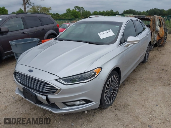 2017 Ford Fusion SE z VIN 3FA6P0HD5HR166433, wystawiony jako IAAI lot #42394998 z przebiegiem 121 333 mil mil oraz . Historia ofert i sprzedaży dostępna na DreamBid. Obrazek 19.