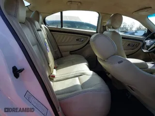 2015 Ford Taurus Limited with VIN 1FAHP2F80FG144421, listed as a IAAI auction lot 41947787 with 143,496 mi miles. Bid and sale history available at carsss.com. Image 8.