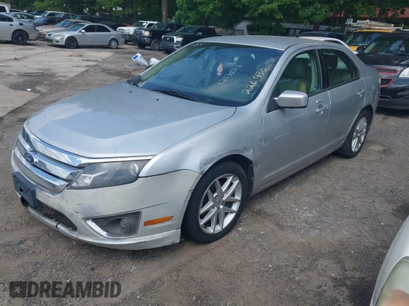 2012 Ford Fusion SEL z VIN 3FAHP0JA2CR226430, wystawiony jako IAAI lot #42130592 z przebiegiem 163 821 mil mil oraz . Historia ofert i sprzedaży dostępna na DreamBid. Obrazek 2.