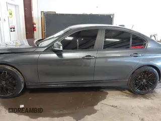 2015 BMW 3 Series 328i xDrive with VIN WBA3B5G53FNS17413, listed as a IAAI auction lot 41643479 with 99,065 mi miles. Bid and sale history available at carsss.com. Image 14.