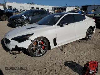 2021 Kia Stinger GT2 with VIN KNAE55LC1M6089121, listed as a Copart auction lot 74823434 with 25,009 mi miles and Salvage Title. Bid and sale history available at carsss.com. Image 1.