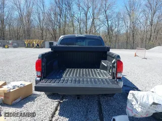 2019 Toyota Tacoma 4WD SR with VIN 3TMCZ5AN2KM268915, listed as a IAAI auction lot 41696555 with 33,573 mi miles. Bid and sale history available at carsss.com. Image 17.