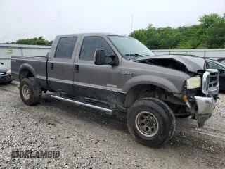 2004 Ford F-250 XL with VIN 1FTNW21P34EC33729, listed as a Copart auction lot 60683245 with 394,551 mi miles and Clean title. Bid and sale history available at DreamBid. Image 4.