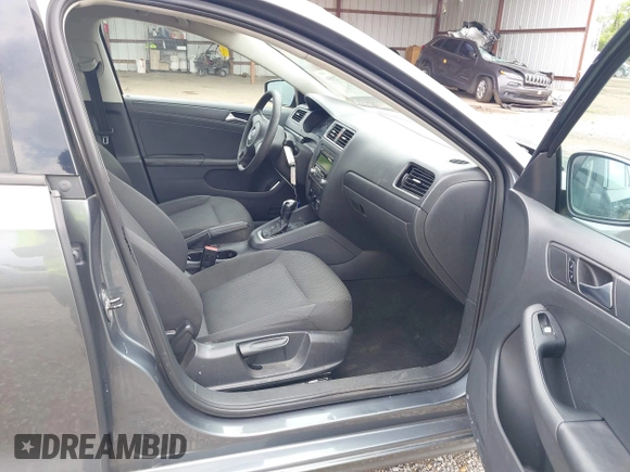 2013 Volkswagen Jetta S z VIN 3VW2K7AJ5DM369293, wystawiony jako IAAI lot #42172959 z przebiegiem 170 983 mil mil oraz . Historia ofert i sprzedaży dostępna na DreamBid. Obrazek 5.