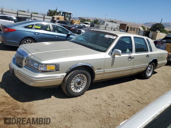 1997 Lincoln Town Car Executive with VIN 1LNLM81W8VY734974, listed as a Copart auction lot 61440195 with 94,982 mi miles and Clean title. Bid and sale history available at DreamBid. Image 1.