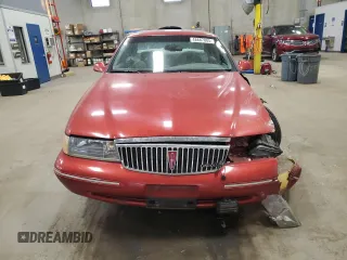1997 Lincoln Continental with VIN 1LNLM97V9VY616128, listed as a Copart auction lot 48687805 with 61,591 mi miles and Salvage Title. Bid and sale history available at carsss.com. Image 5.