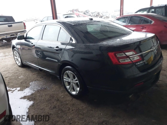 2015 Ford Taurus SEL z VIN 1FAHP2E87FG203272, wystawiony jako IAAI lot #41717231 z przebiegiem 95 829 mil mil oraz . Historia ofert i sprzedaży dostępna na DreamBid. Obrazek 3.