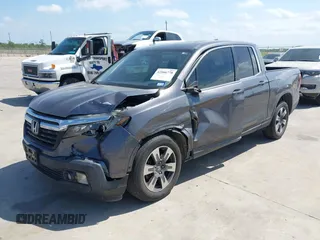 2019 Honda Ridgeline RTL with VIN 5FPYK2F59KB004653, listed as a IAAI auction lot 42066778 with 90,144 mi miles and . Bid and sale history available at DreamBid. Image 17.
