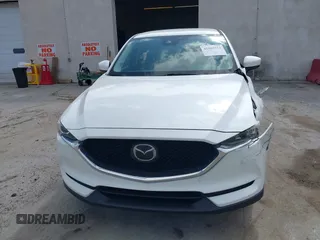 2018 Mazda CX-5 Touring with VIN JM3KFBCMXJ0353369, listed as a IAAI auction lot 41902554 with 154,104 mi miles and . Bid and sale history available at DreamBid. Image 13.