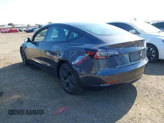 2023 Tesla Model 3 with VIN 5YJ3E1EA7PF447409, listed as a IAAI auction lot 41965416 with 40,033 mi miles and . Bid and sale history available at DreamBid. Image 3.