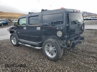 2006 Hummer H2 with VIN 5GRGN23U36H101486, listed as a Copart auction lot 74577884 with 146,203 mi miles and Salvage Title. Bid and sale history available at carsss.com. Image 2.