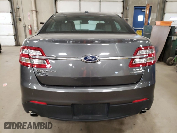 2015 Ford Taurus SEL with VIN 1FAHP2E81FG167546, listed as a Copart auction lot 49114795 with 185,587 mi miles and Salvage Title. Bid and sale history available at carsss.com. Image 6.