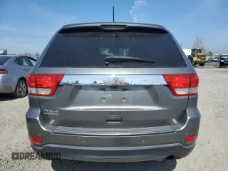 2011 Jeep Grand Cherokee Laredo with VIN 1J4RR4GGXBC702300, listed as a Copart auction lot 49736255 with 163,684 mi miles and Salvage Title. Bid and sale history available at carsss.com. Image 6.