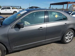 2011 Ford Fusion SE with VIN 3FAHP0HA7BR319917, listed as a IAAI auction lot 41845471 with 115,071 mi miles. Bid and sale history available at carsss.com. Image 14.