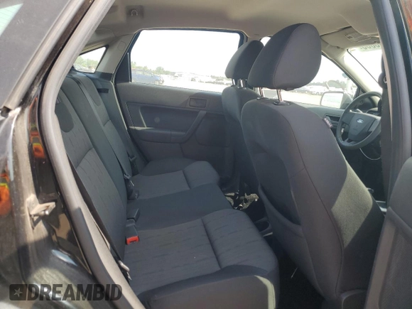2008 Ford Focus SE z VIN 1FAHP35NX8W215744, wystawiony jako Copart lot #56096055 z przebiegiem 165 827 mil mil oraz Szkoda całkowita • Salvage title. Historia ofert i sprzedaży dostępna na DreamBid. Obrazek 10.