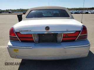 2005 Mercury Grand Marquis GS with VIN 2MEFM74W55X654070, listed as a Copart auction lot 53114785 with 56,128 mi miles and Salvage Title. Bid and sale history available at DreamBid. Image 6.