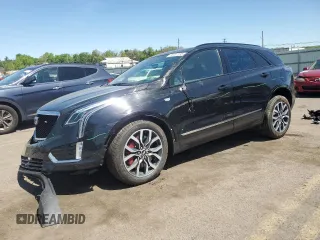 2023 Cadillac XT5 AWD Sport with VIN 1GYKNGRS8PZ100581, listed as a Copart auction lot 55157035 with 14,637 mi miles and Salvage title. Bid and sale history available at DreamBid. Image 1.