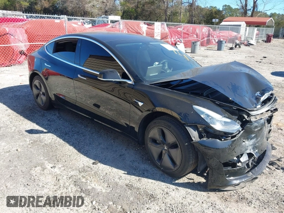 2019 Tesla Model 3 Mid Range with VIN 5YJ3E1EA2KF306286, listed as a IAAI auction lot 41699127 with 56,249 mi miles and . Bid and sale history available at DreamBid. Image 1.