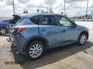 2014 Mazda CX-5 Touring with VIN JM3KE4CYXE0409558, listed as a Copart auction lot 51762995 with 91,082 mi miles and Salvage Title. Bid and sale history available at carsss.com. Image 3.