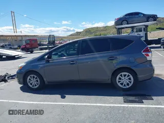 2015 Toyota Prius Two with VIN JTDZN3EU2FJ031520, listed as a IAAI auction lot 41950491 with 174,379 mi miles and . Bid and sale history available at DreamBid. Image 14.